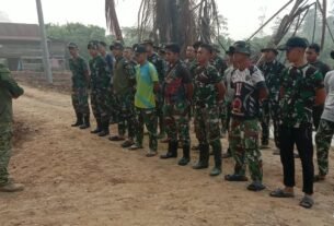 Sinergi TNI dan Masyarakat dalam Apel Pagi Sebelum Mulai Tugas TMMD