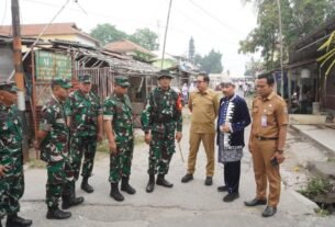 Pemantauan Proyek TMMD untuk Pembangunan Jalan di Desa Sumur Bandung